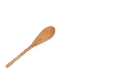 A brown wooden spoon on white isolated background with copy space