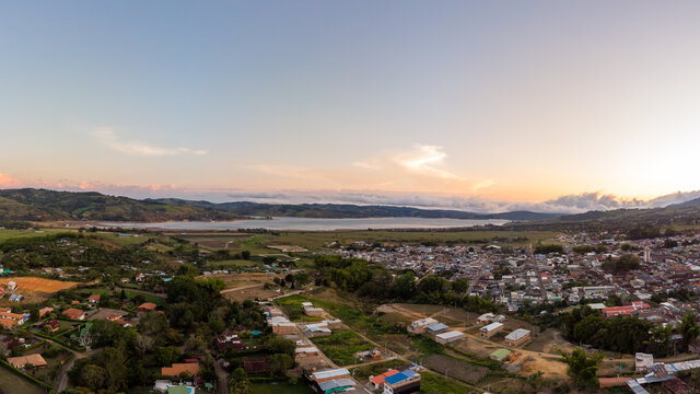 aerial panorama photo of lake calima's town in colombia