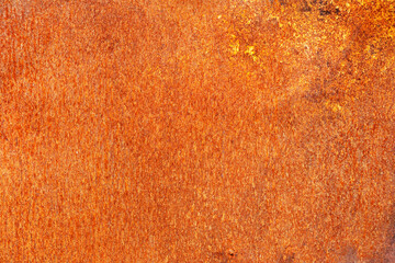Creative background of rusty metal, painted gray paint carelessly with the remnants of torn paper. Grungy metal surface. Great background or texture for your project.