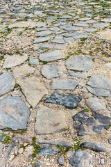 Urban stone paving, perspective. Texture, background, selective focus