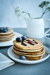 stack of pancakes with blueberries
