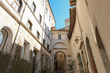 alley with arch in the historic center of the medieval town spoleto umbria italy
