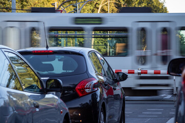 Cologne tram at a street crossing, traffic light is on red