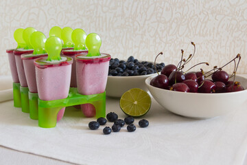 homemade sorbet in ice cream makers with berries