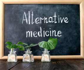 Alternative medicine. The inscription on the slate board.
