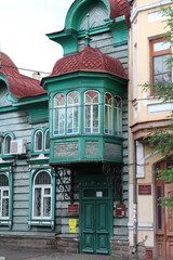 Vintage wooden Ignatyeva's house with carved windows on Anokhin Street, 53, Chita city, Russia. Russian style in architecture. Chita landmark, monument. Chita sight, landmark © Sergey