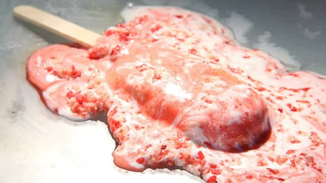 Time-Lapse of Strawberry Shortcake Ice Cream Popsicle melts (4k video)