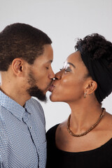 Romantic black couple kissing