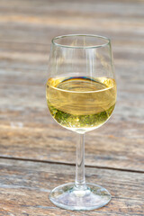 Tasting of Dutch dry white wine on vineyard in summer