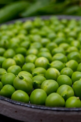 New harvest of ripe green peas legumes