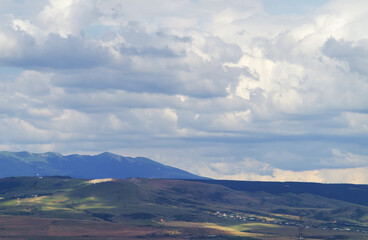 Summer mountains green grass and blue sky landscape