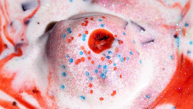 Time-Lapse Ice Cream scoop with sprinkles melts (4k video)