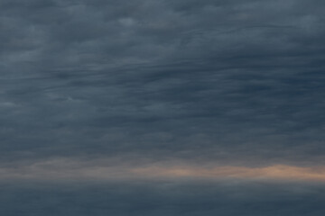 Dark ominous grey clouds. Dramatic sky.