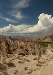 Vertical photo. Arid landscape. Geology. View of the dry valley, sandstone and rocky hills.