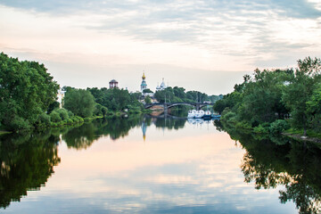 Fototapeta na wymiar Summer River cityscape of small russian town