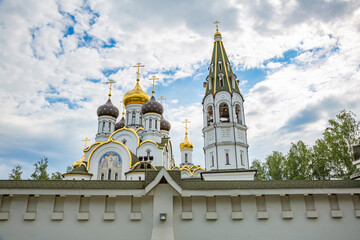 Fototapeta na wymiar The facade of the Temple of Saint Prince Alexander Nevsky. Knyazhye Lake, Russia