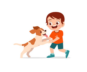 happy cute little kid boy girl play with pet dog