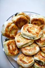 Home made donut pie with spinach and cheese. It is the most famous food of the Mediterranean. Vegan food. 