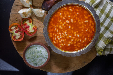 An Anatolian culture dish, bulgur pilaf and bean dish at the table