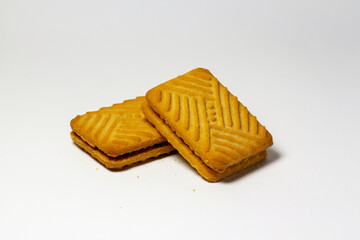 Chocolate cream biscuits one over another