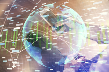 Double exposure of man's hands holding and using a phone and international business theme drawing.