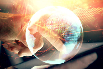 Double exposure of man's hands holding and using a phone and international business theme drawing.