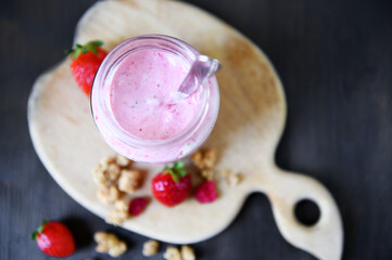 Healthy breakfast. Natural strawberry yoghurt. Selective focus.