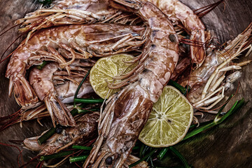 shrimp set whole unpeeled tasty lemon piece background culinary sea food asia