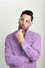 Obraz premium Portrait of handsome bearded hipster man with eyeglasses