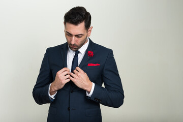 Portrait of handsome bearded businessman in suit