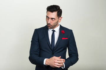 Portrait of handsome bearded businessman in suit