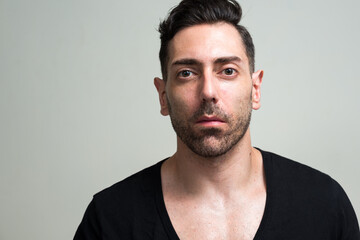 Fototapeta premium Portrait of handsome man with beard stubble