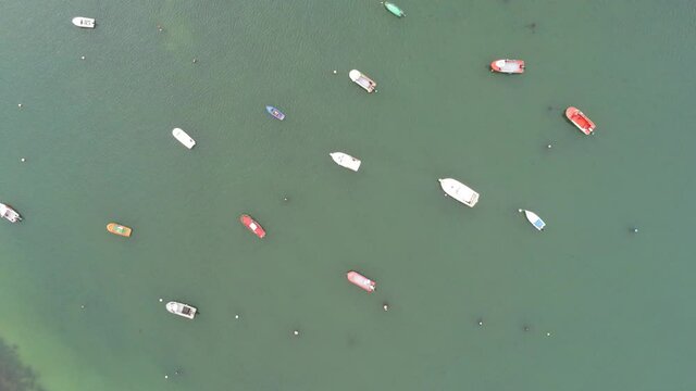 Boats moored in Coastal village of Galicia,Spain. Aerial Drone Footage
