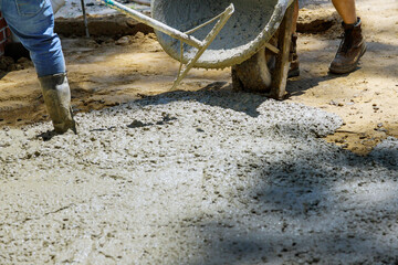 Construction process making of freshly poured cement sidewalk