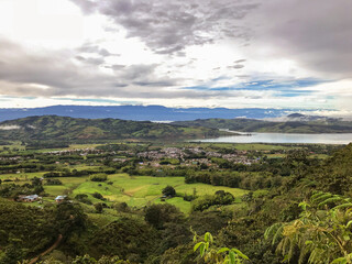 panoramic view of lake calima from surrounding mountains