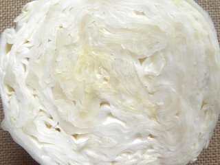 Cut cross section detail of white color raw fresh Cabbage