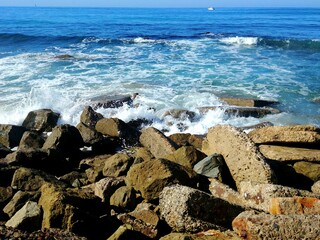 waves breaking on the rocks