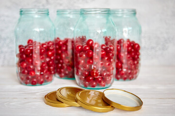 Production of cherry compote in jars. Homemade canned food. The concept of handmade