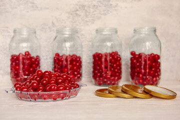 Production of cherry compote in jars. Homemade canned food. The concept of handmade