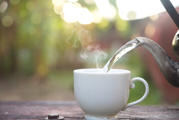 Hot water with smoke from  the old kettle