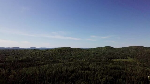 Aerial panning of the mountains in the Stornoway, Quebec area