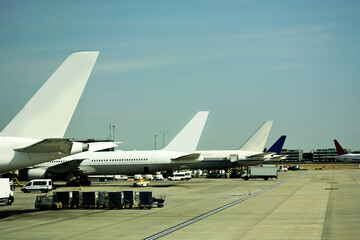 Fototapeta na wymiar Close-up of large passenger aircraft on runway in airport