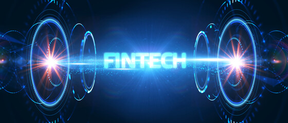 Fintech -financial technology concept.Young businessman  select the icon Fintech on the virtual display.