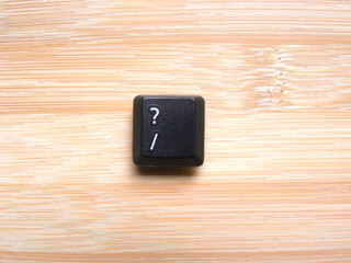 Black color Question mark key of computer keyboard