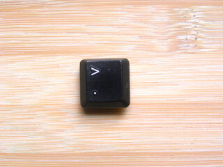 Black color Greater than key of computer keyboard