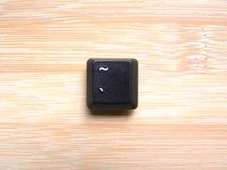 Black color Tilde key of computer keyboard