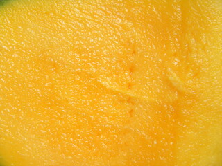 Cut cross section detail of yellow ripe Kalaphad mango