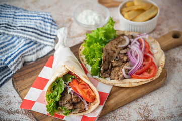 gyro wrap on wooden cutting board