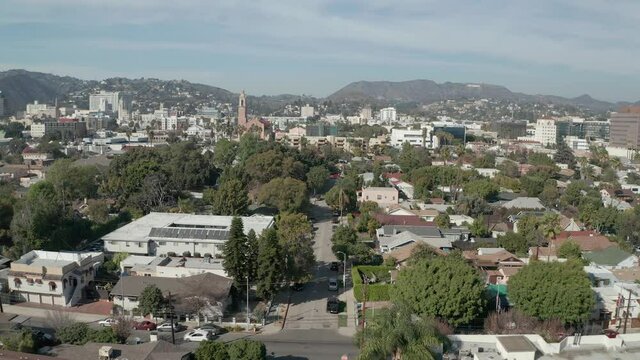 Aerial wide shot of the Hollywood city sprawl during the day. 4K