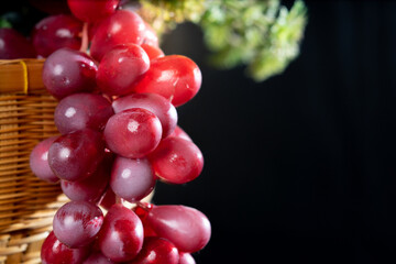 fresh fruit grapes on black background 